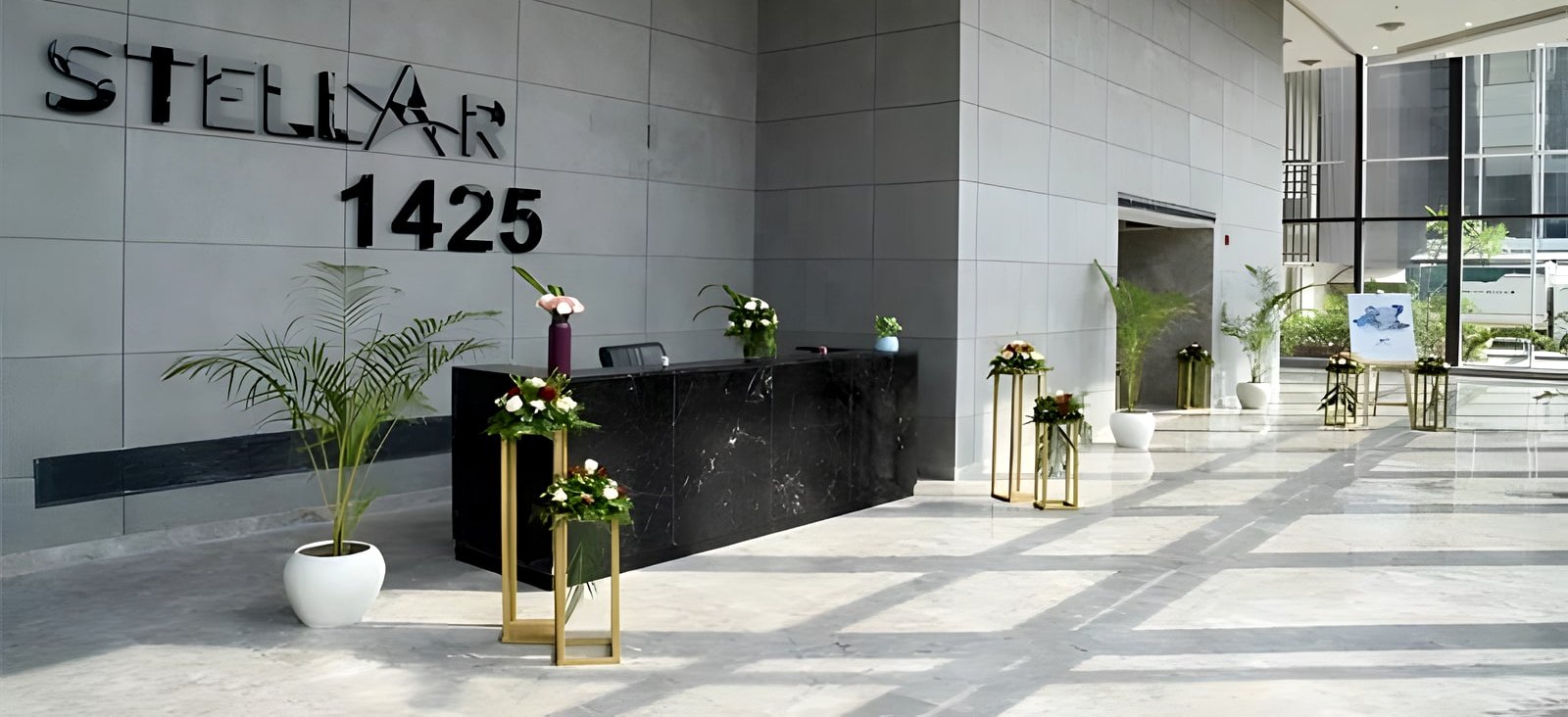 The Stellar 1425 lobby with stone reception